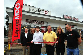 Pequannock officials cut ribbon at Laptop MD