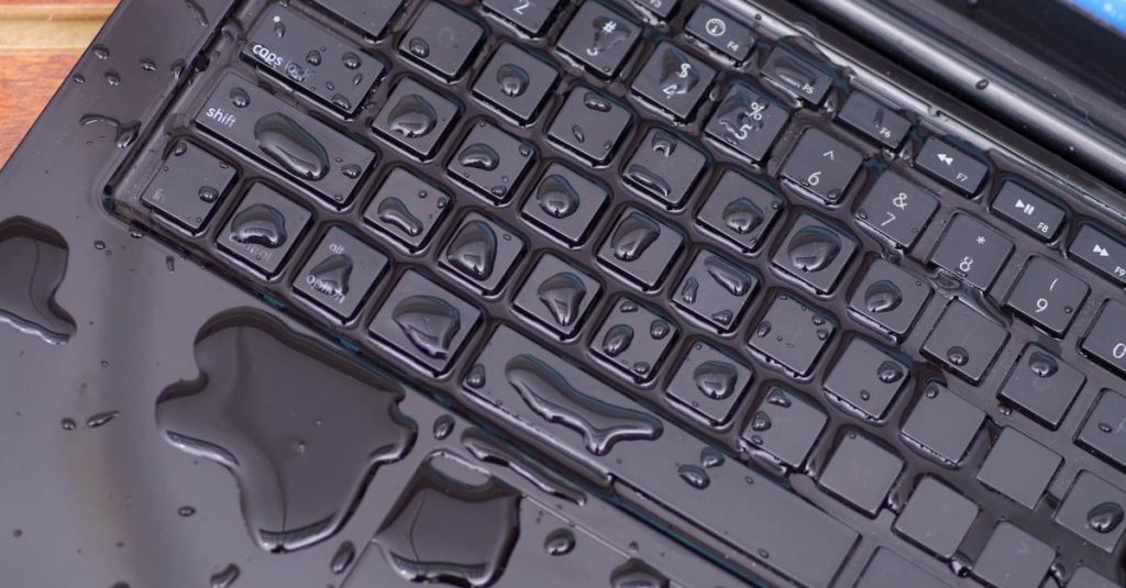 water spilled on computer